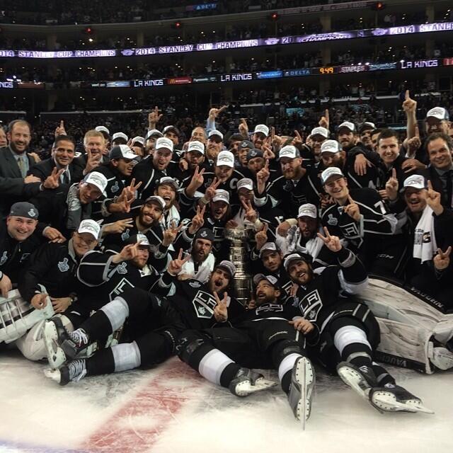Los Angeles Kings players and staff celebrating their 2014 Stanley Cup win on the ice